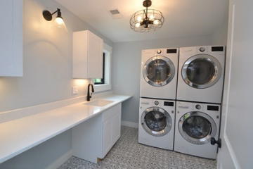 white laundry room with sink